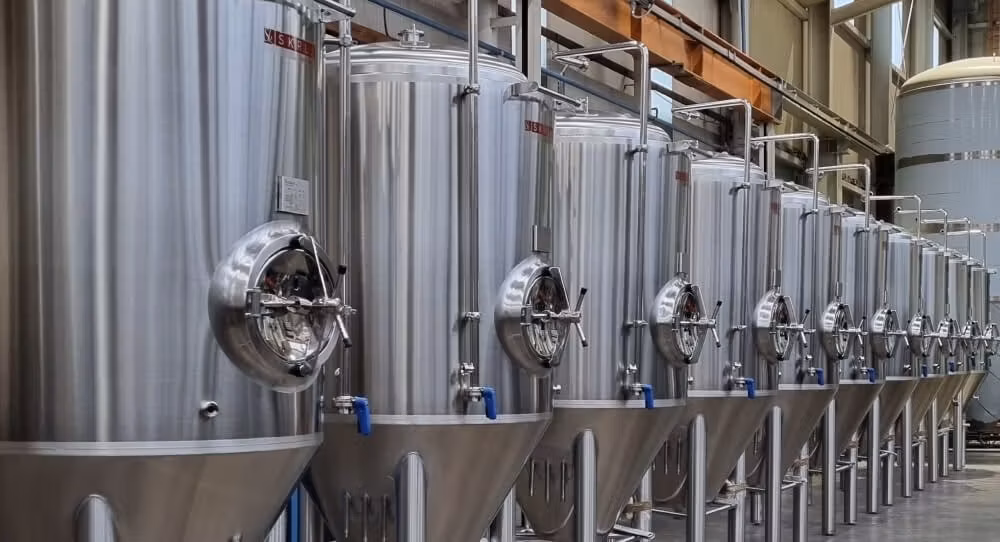 stainless steel products - image of row of conical bottom fermentation tanks
