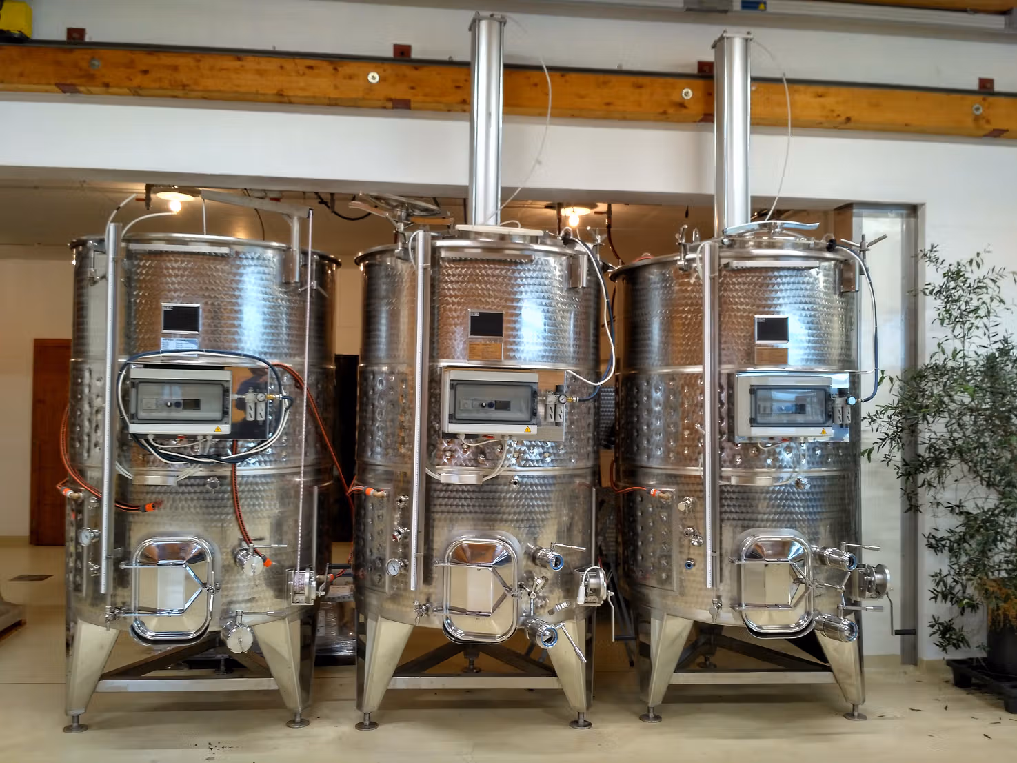 wine fermentation tanks. How to Choose the Right Wine Fermentation Tank for Your Winery blog-header image